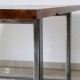Der Materialmix macht´s! Tisch MAREN verbindet Massivholz mit einzigartiger Maserung mit Stahl, Aluminium und Edelstahl.